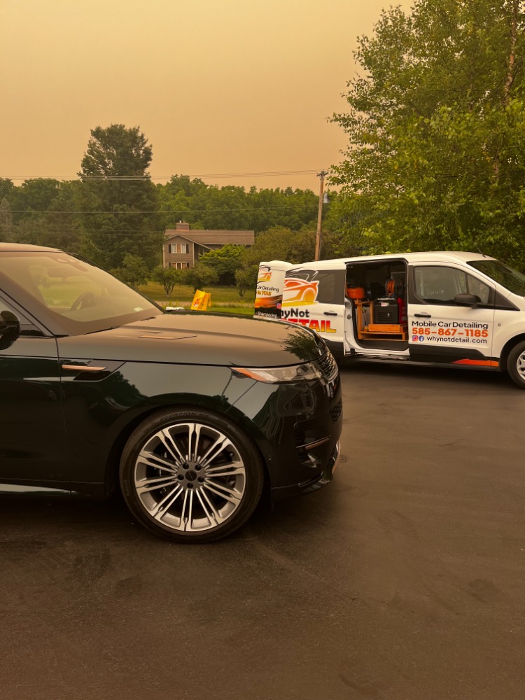 Range Rover detailed alongside the WhyNot Detail mobile van