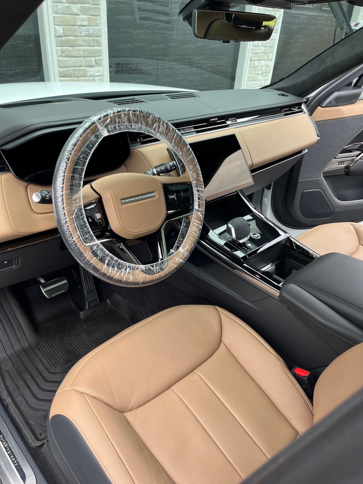 Professional interior detailing showcase - pristine car interior with leather seats